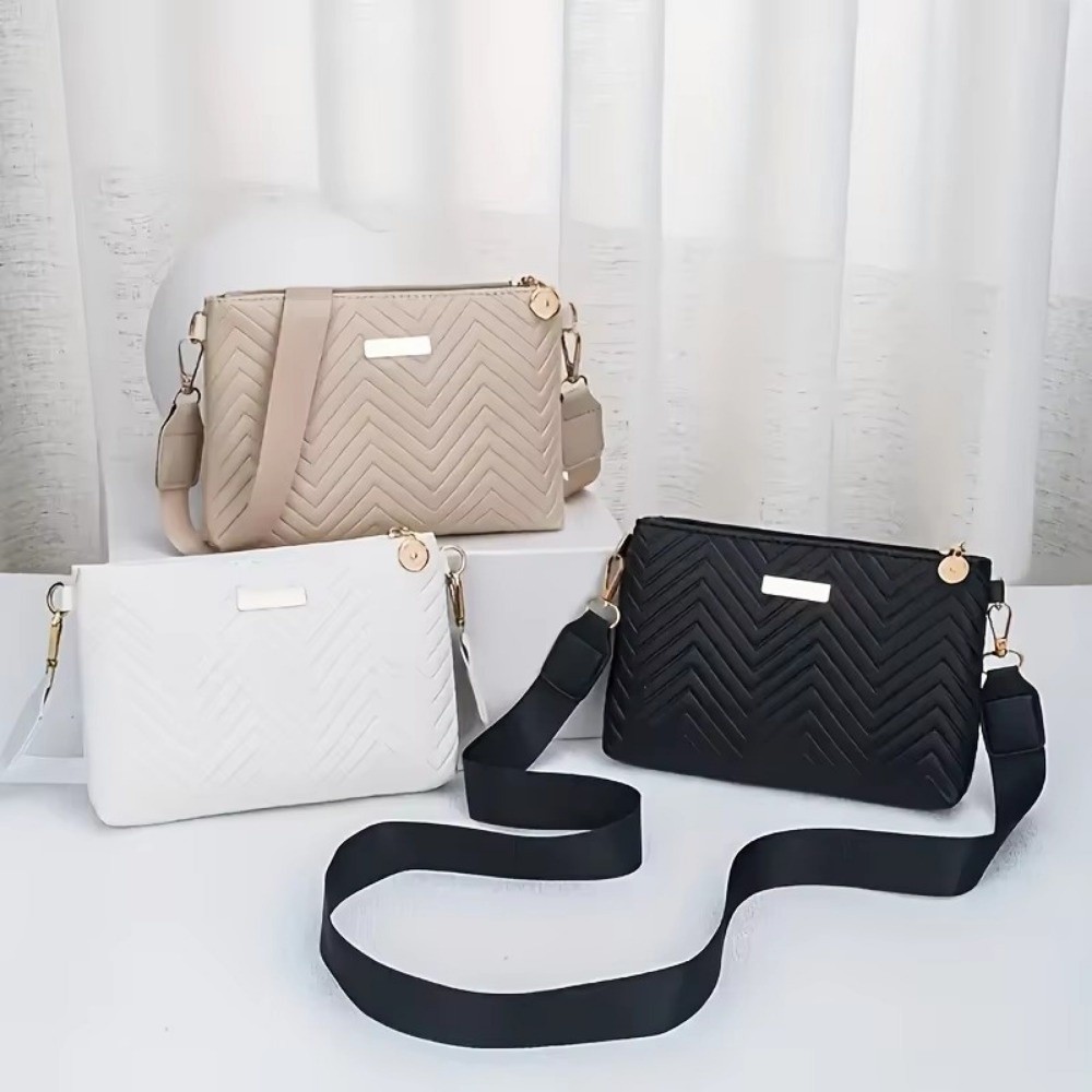 Chain Crossbody Quilted - Elegante gesteppte Ketten-Umhängetasche mit Wellenmuster, einfarbig,
